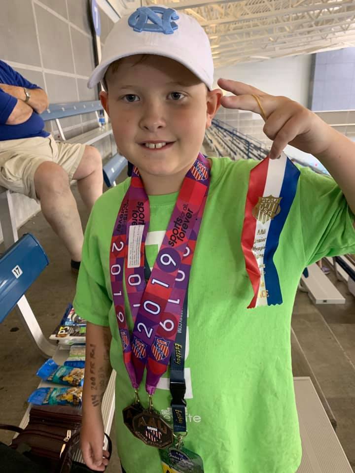 SGE Students Place in Junior Olympics for Swimming