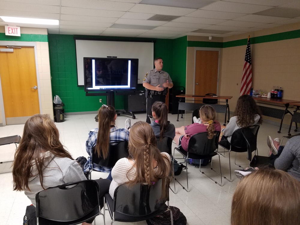 Officer Jacob Hutchings speaks with juniors about traffic safety.