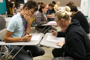 Contemporary Issues Students Take on "Speed News" Activity